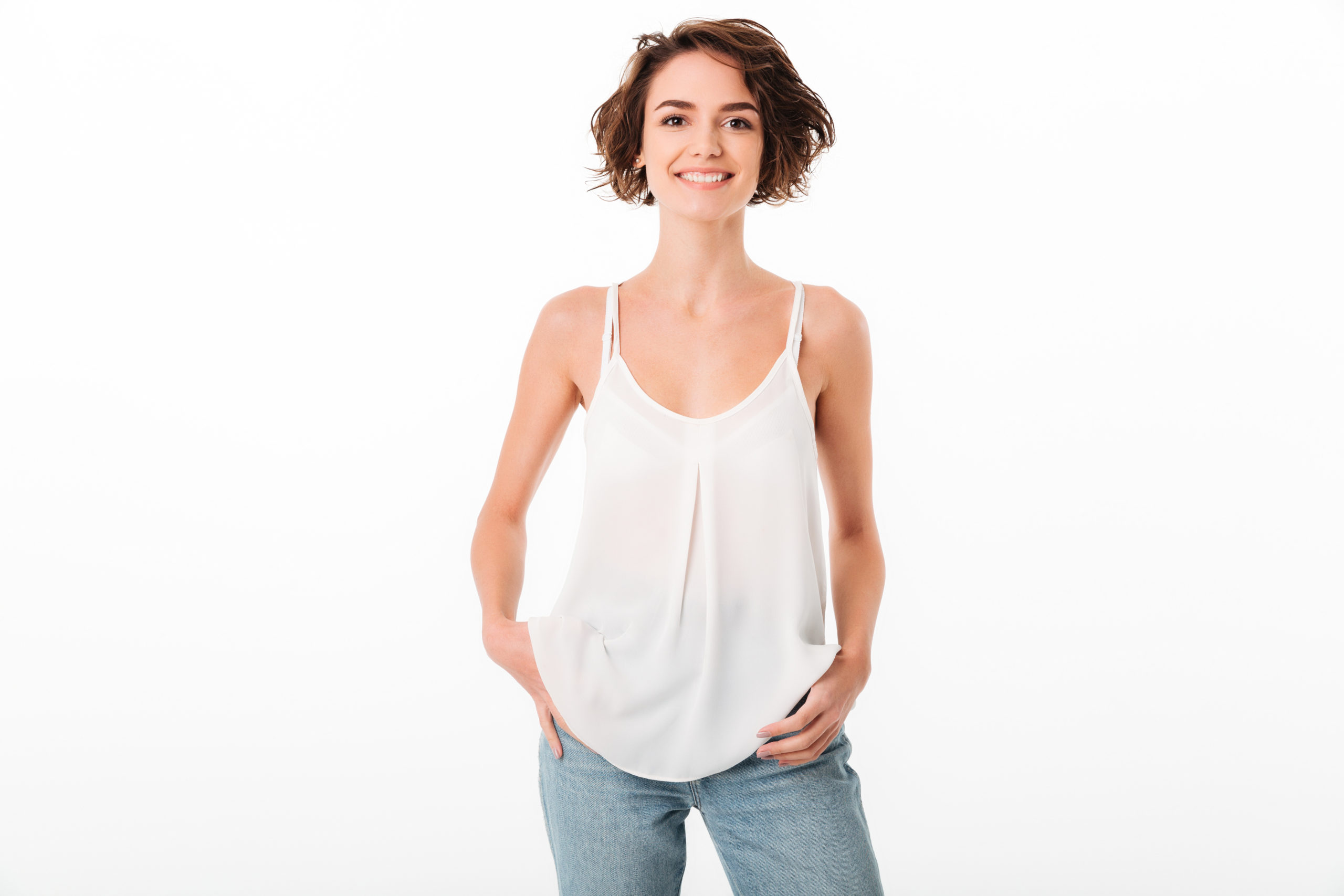 Portrait of a smiling young girl posing while standing
